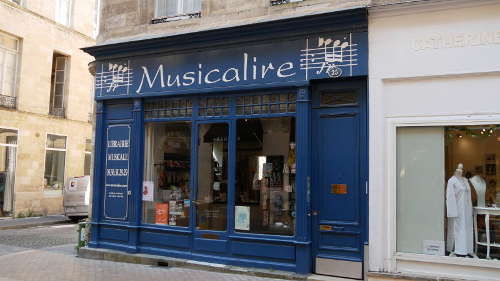 Porte partition musique - Instruments de musique sur Rue du Commerce